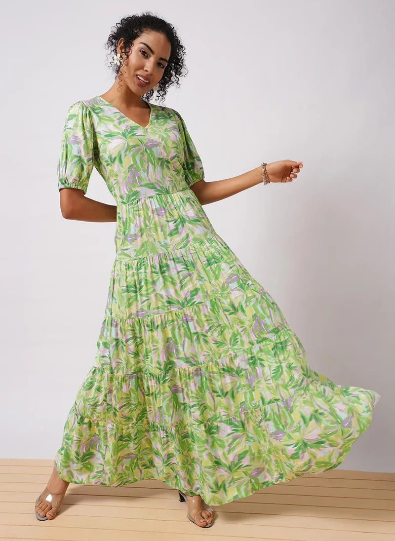 جلو باص فستان ماكسي نسائي بطبعات استوائية وأكمام منفوشة من جلوبس